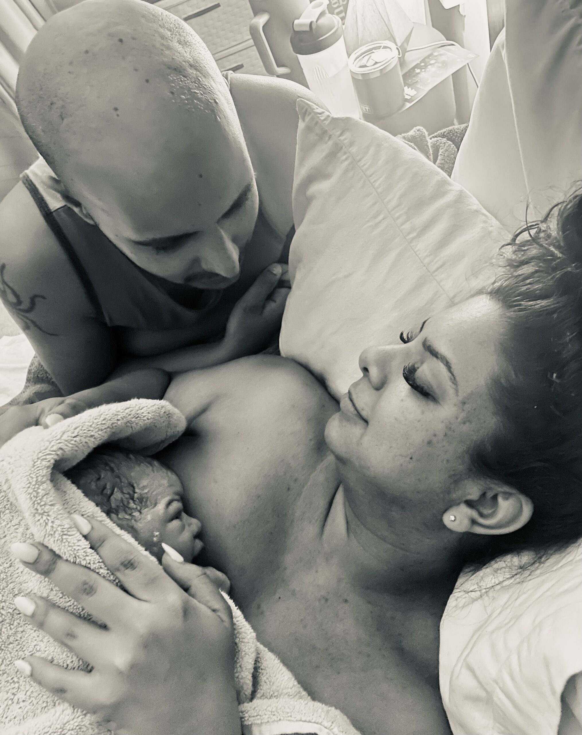 A couple sharing an intimate moment in bed.